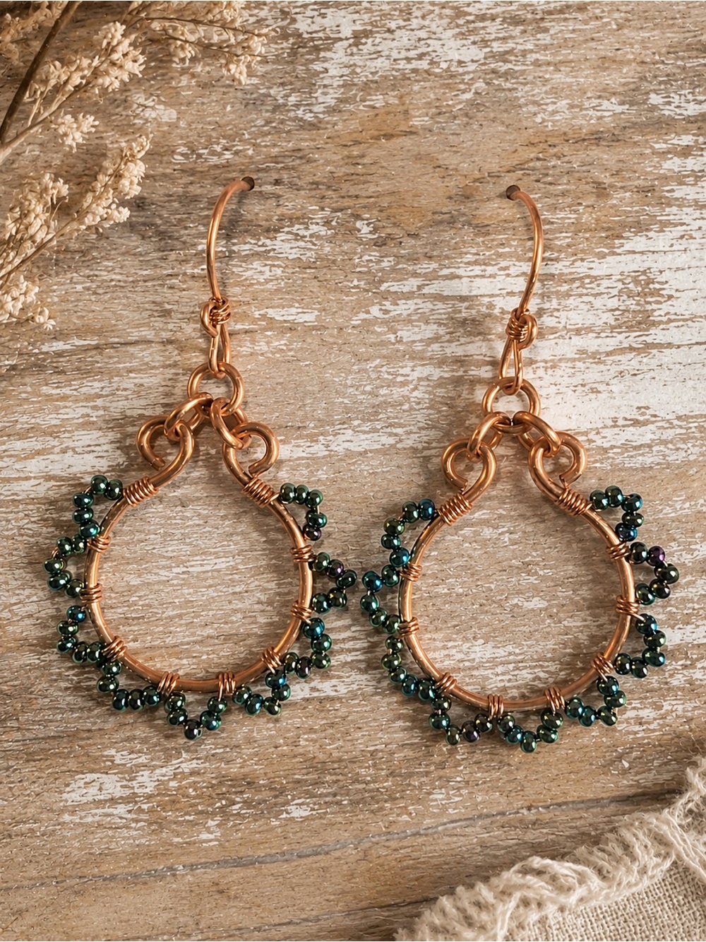 Copper Hoop Earrings with Iridescent Green Bead Accents